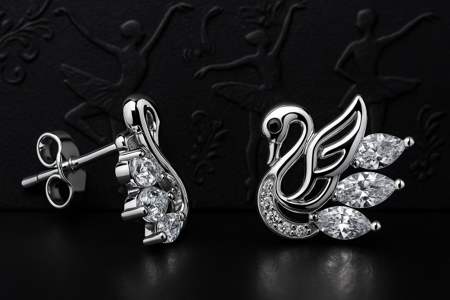 925 sterling silver swan stud earrings with sparkling cubic zirconia stones on a dark background