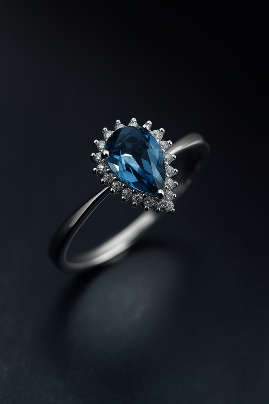 925 Sterling Silver Pear-Cut Blue Stone Halo Ring – Elegant Zircon Accent Design